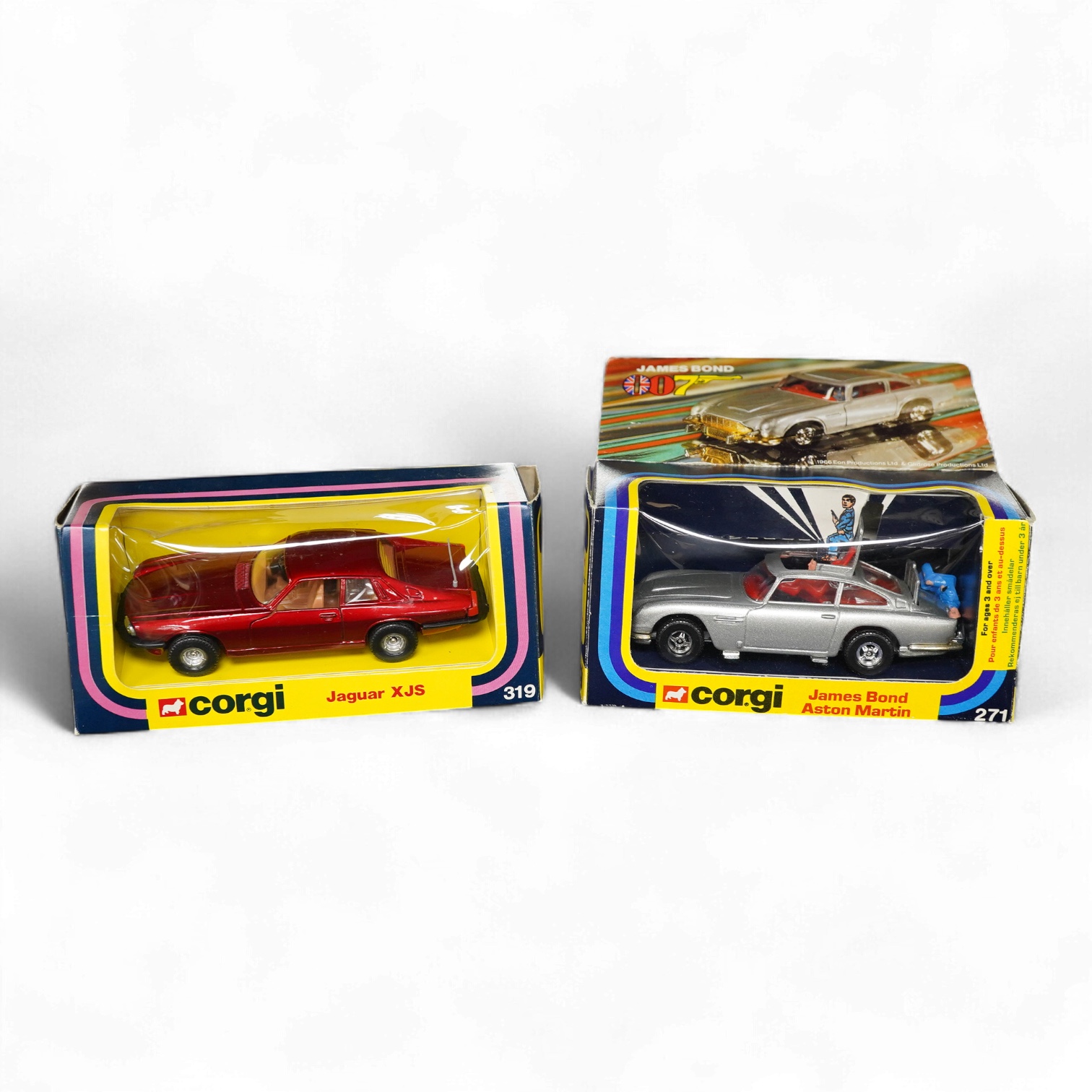 Two boxed 1970s Corgi Toys; a James Bond Aston Martin (261) in silver with passenger, together with a Jaguar XJS (319) in metallic red